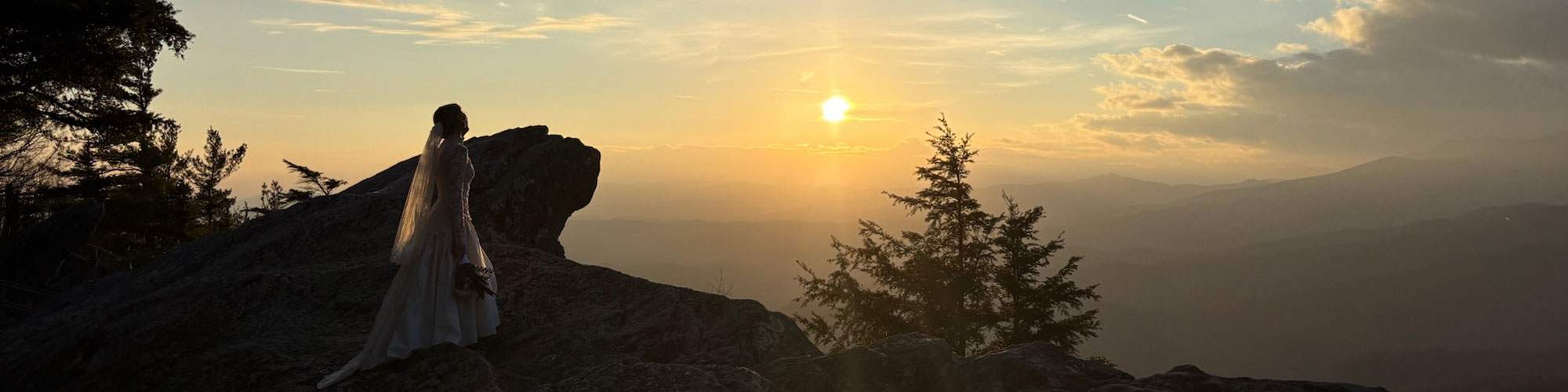 Bride On Hill Overlooking Sunset